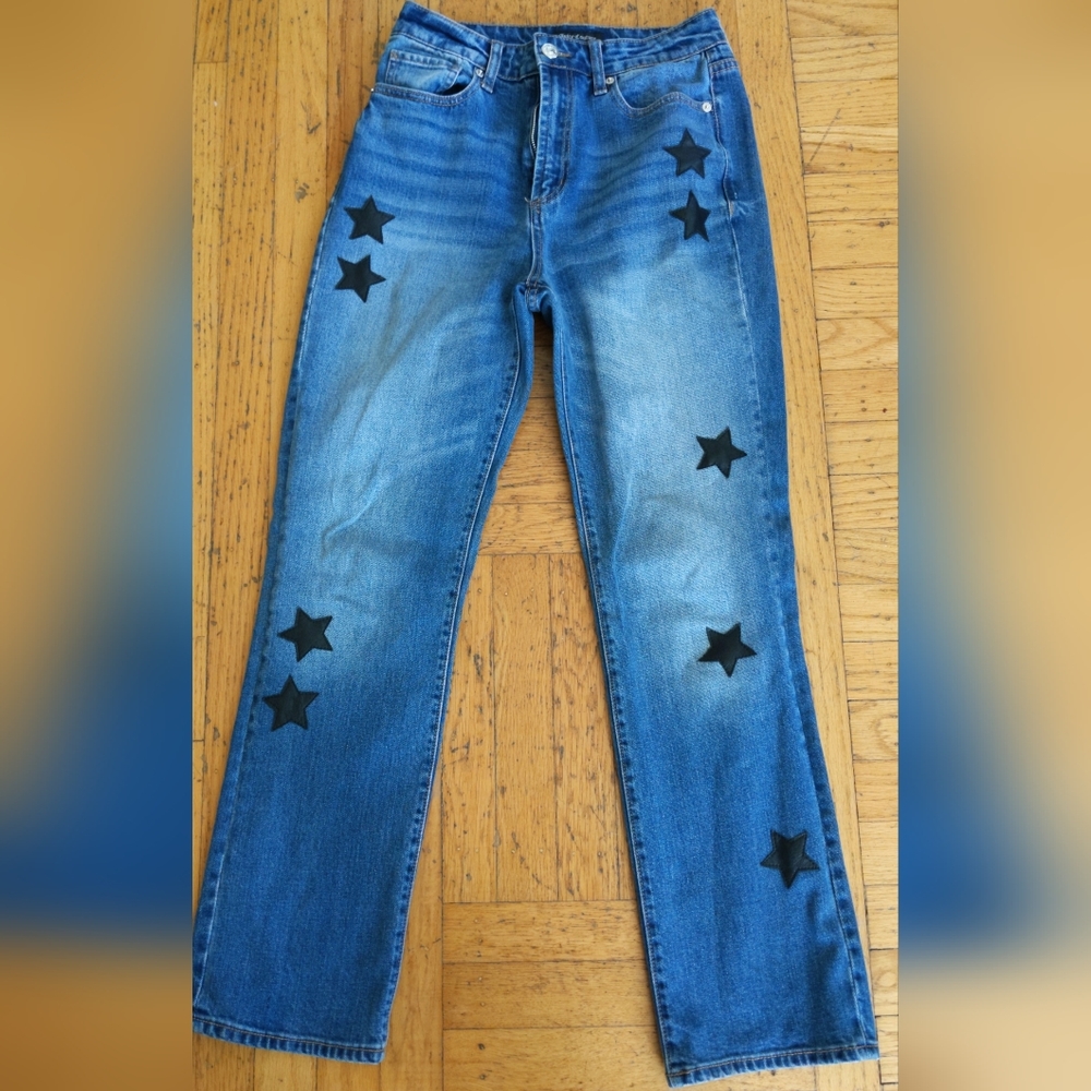 Juicy couture size 26 blue jeans with black leather stars